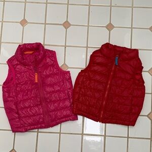 Primary Kids Puffer Vests in Red and Pink